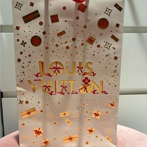 Louis Vuitton Festive Bag with Red Handles